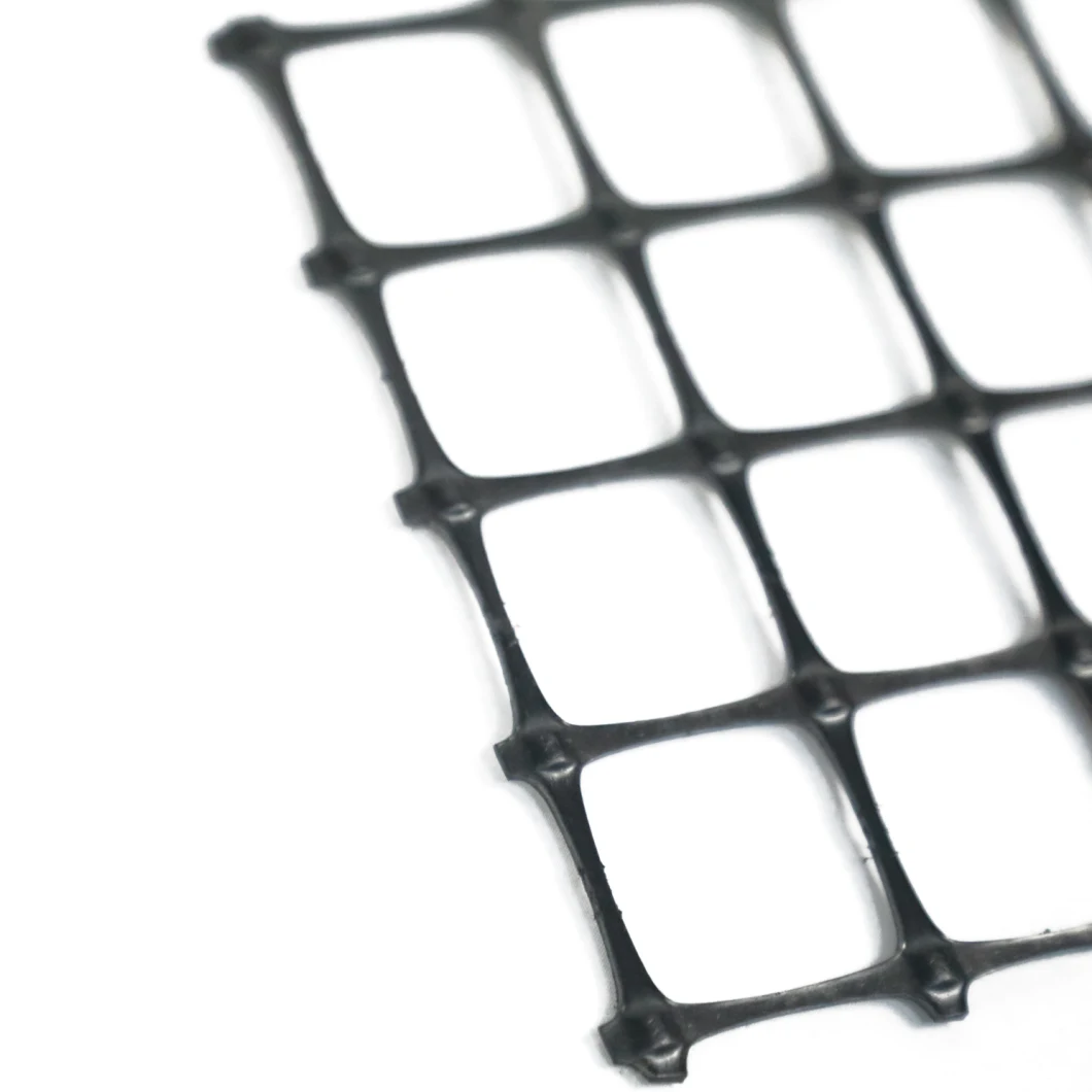 La pente de sol d'OIN d'usine mure la grille noire de gravier de Geogrid 50-50kn de polyester de haute résistance de renfort