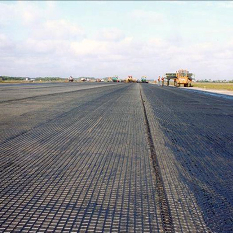 La pente de sol d'OIN d'usine mure la grille noire de gravier de Geogrid 50-50kn de polyester de haute résistance de renfort