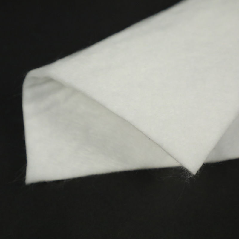 Matériau géosynthétique à haute résistance routière pavage routier Construction PP PET Fibre non tissée géotextile prix