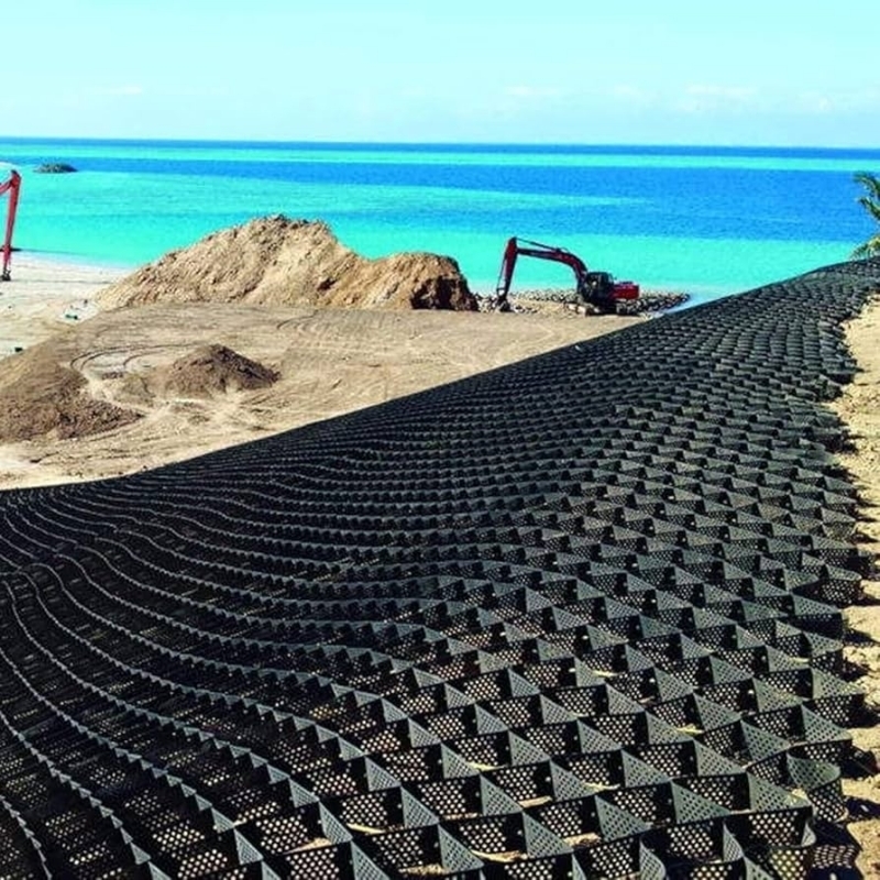 Géocellule HDPE texturée avec trous, système de confinement cellulaire élevé, géocellule HDPE en nid d'abeille pour fondation routière, protection de talus, parking, allée, mur de soutènement
