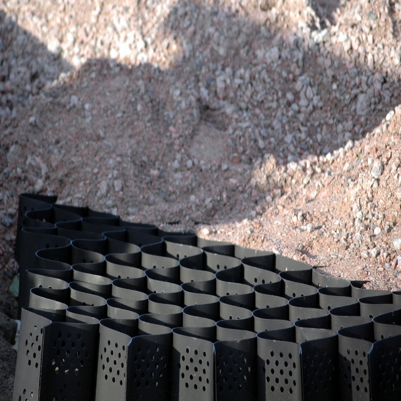 Géocellule HDPE texturée avec trous, système de confinement cellulaire élevé, géocellule HDPE en nid d'abeille pour fondation routière, protection de talus, parking, allée, mur de soutènement