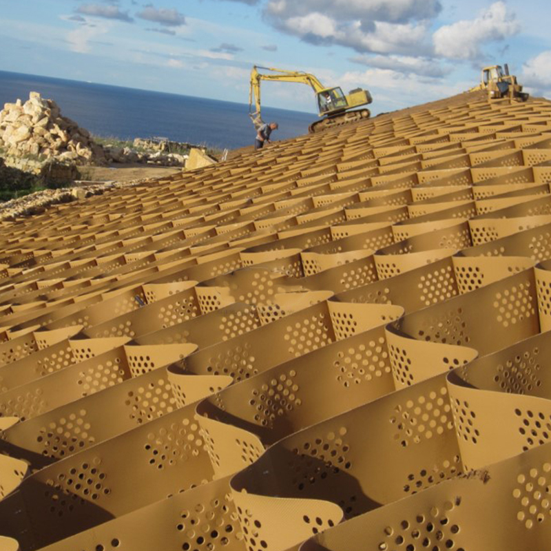 Réseau de gravier géocellulaire en plastique HDPE texturé et perforé destiné à la stabilisation des allées, au renforcement de la base des routes, au parking et à la protection des pentes