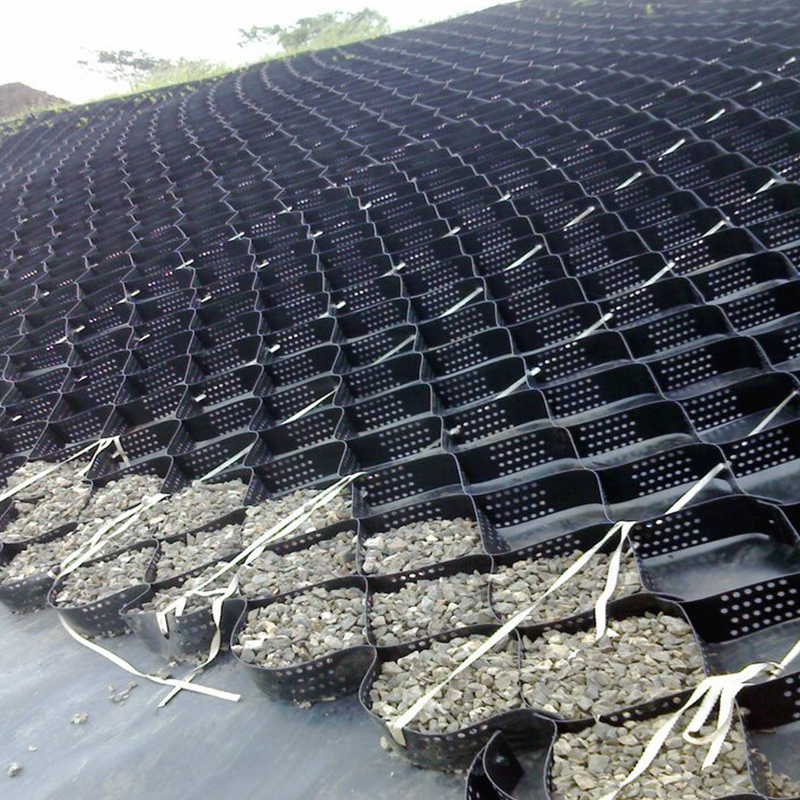 Réseau de gravier géocellulaire en plastique HDPE texturé et perforé destiné à la stabilisation des allées, au renforcement de la base des routes, au parking et à la protection des pentes