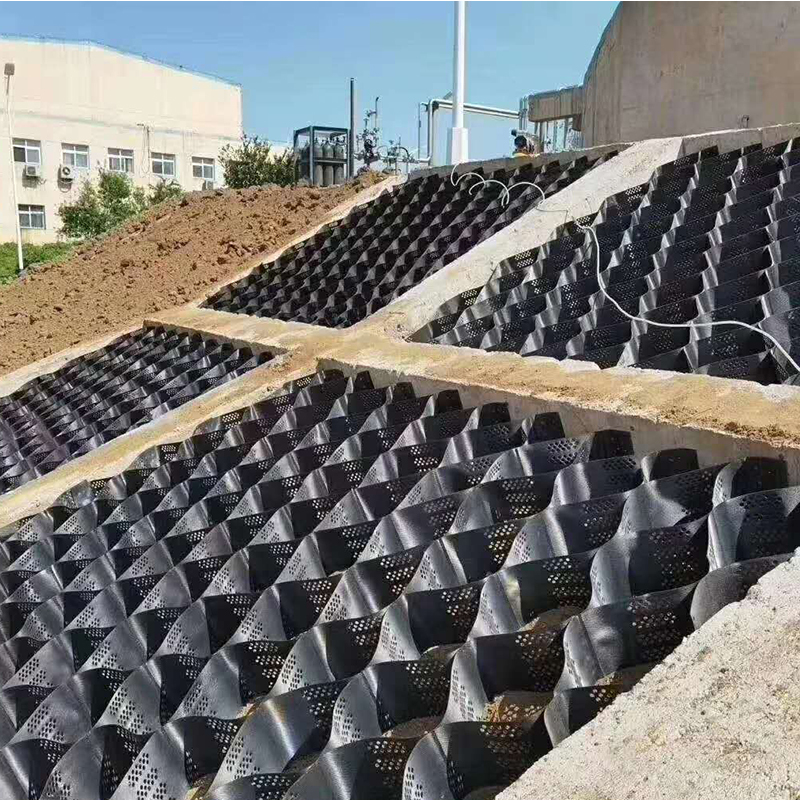 Réseau de gravier géocellulaire en plastique HDPE texturé et perforé destiné à la stabilisation des allées, au renforcement de la base des routes, au parking et à la protection des pentes